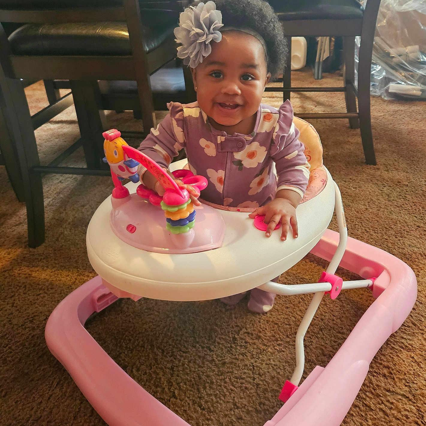 Xolani-Destiny is registered to the contest to win money with this photo: architecture, baby, building, chair, clothing, cutlery, diningroom, diningtable, face, furniture, happy, head, indoors, person, photography, portrait, room, sitting, spoon, table