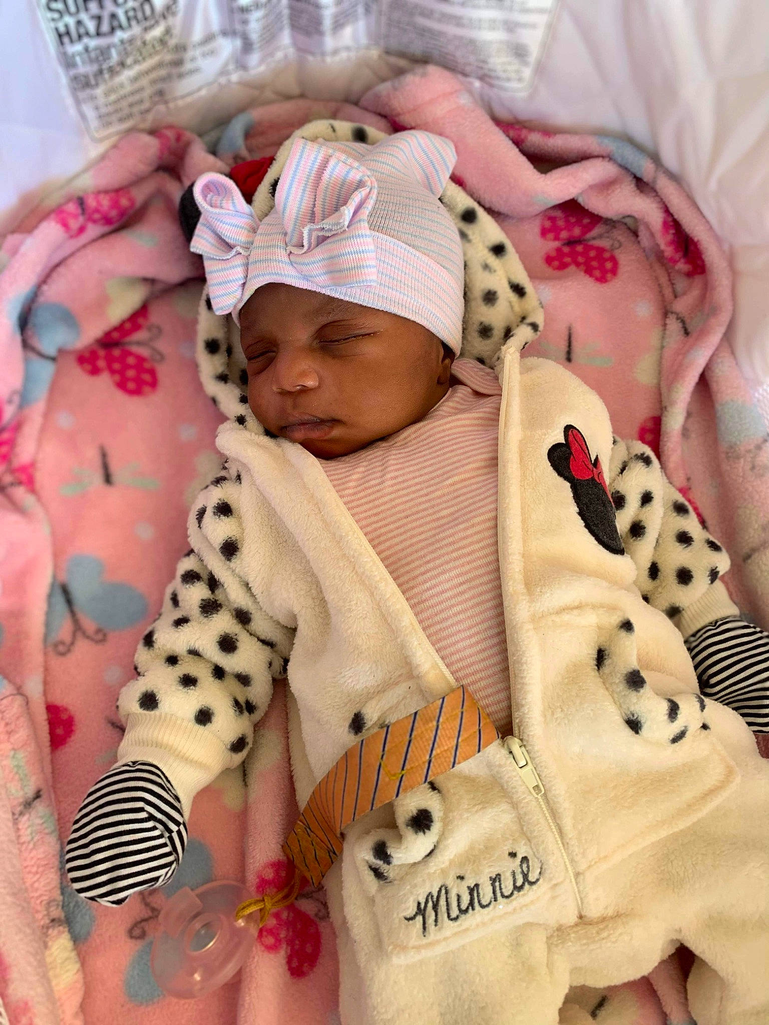 Raniya is registered to the contest to win money with this photo: baby, baby_safety, baby_sleeping, baby_toddler_clothing, bedding, child, comfort, facial_expression, fur, headwear, linens, outerwear, pattern, peach, person, pink, product, skin, sleeve, textile