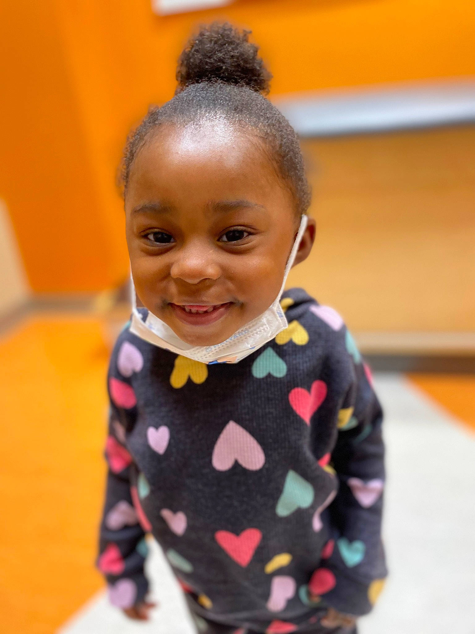 Serenity is registered to the contest to win money with this photo: art, child, entertainment, event, fashion_design, flooring, fun, hairstyle, happy, joy, pattern, performing_arts, person, play, polka_dot, room, sitting, smile, toddler