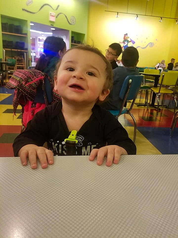 Porter is registered to the contest to win money with this photo: child, face, fun, head, person, room, smile, toddler