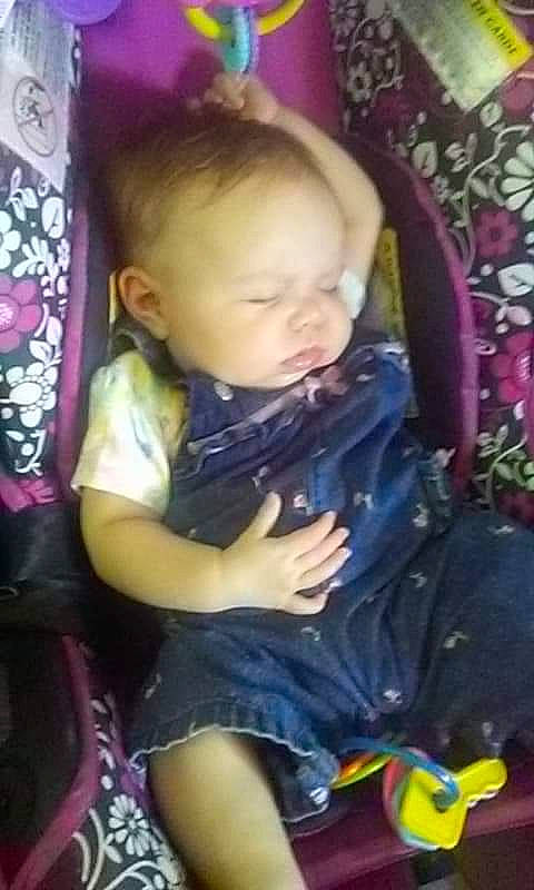 Ember is registered to the contest to win money with this photo: baby, baby_products, cheek, child, cool, ear, eye, face, facial_expression, forehead, hair, head, nose, person, play, product, purple, skin, snapshot, toddler