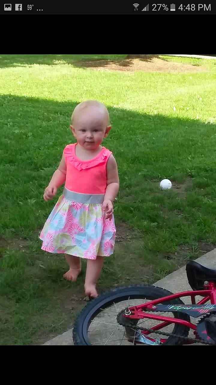 Karma is registered to the contest to win money with this photo: child, cool, day, fun, girl, grass, lawn, person, photograph, picnic, pink, plant, play, product, recreation, sitting, snapshot, summer, toddler, vacation