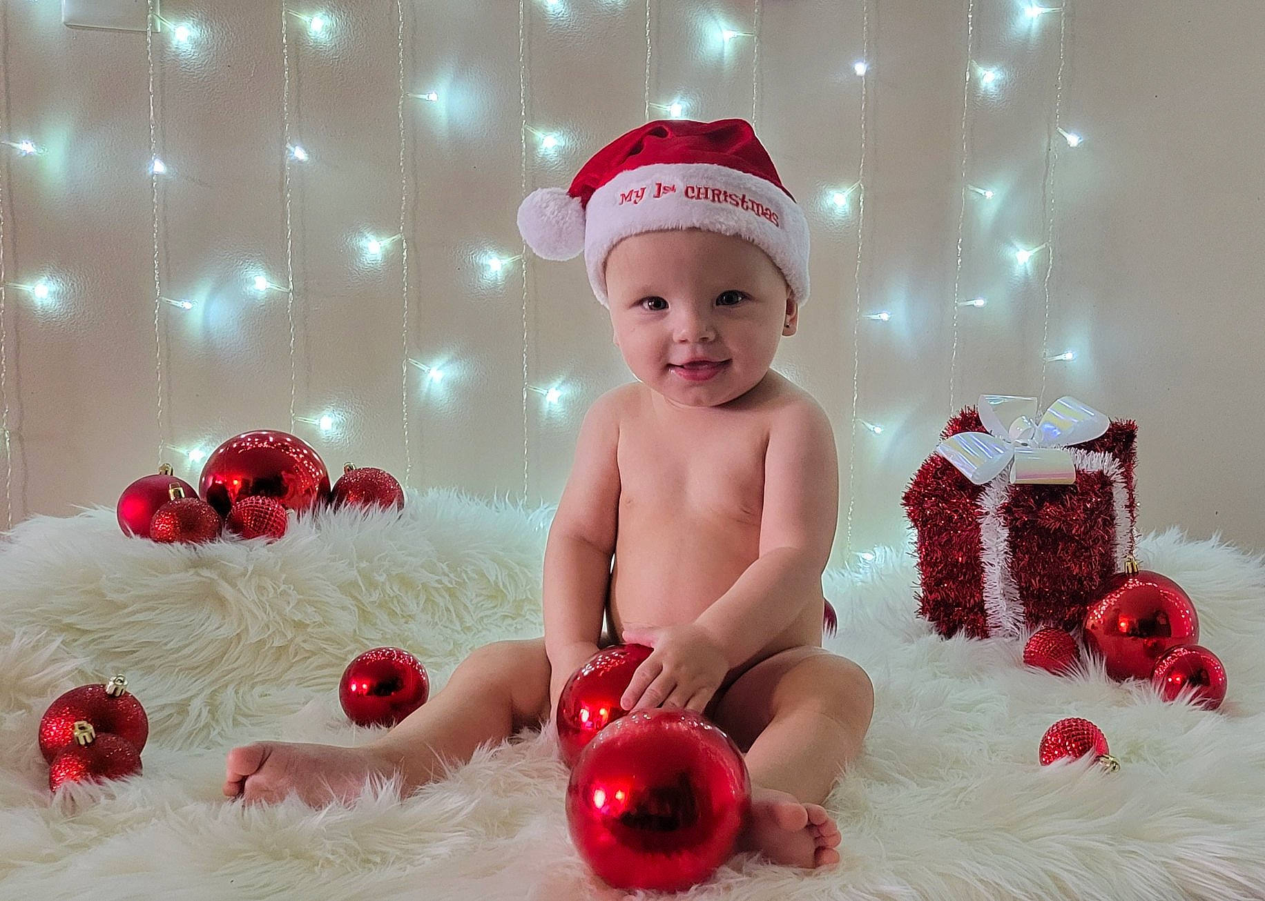 Zayden joined the competition — help win amazing prizes! baby, baby_toddler_clothing, carmine, child, christmas, christmas_ornament, costume_hat, event, fun, happy, headwear, holiday, joy, mammal, person, photograph, pink, red, santa_claus, smile