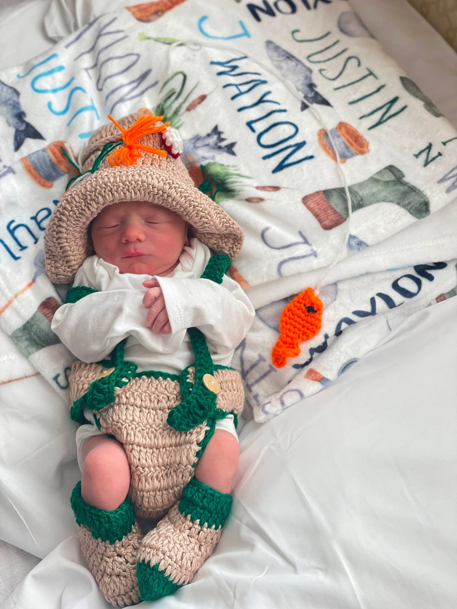 Justin is registered to the contest to win money with this photo: baby, baby_products, baby_toddler_clothing, child, costume, costume_hat, cowboy_hat, event, fashion_accessory, fictional_character, font, hat, headwear, linens, pattern, person, product, sun_hat, toddler
