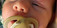Leo joined the competition — help win amazing prizes! baby, infant, pacifier, face, closeup, sleepy, skin, mouth, clothing, newborn, child, portrait, cute, young, head, eyes, expression, babywear, soft_light, human