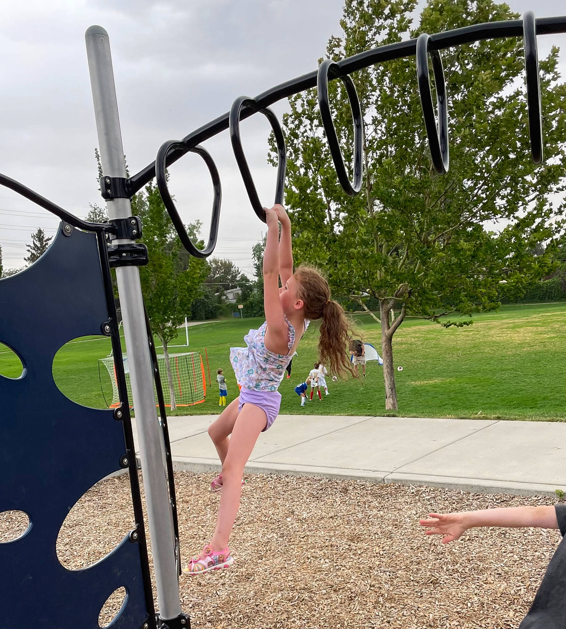Mckynlie joined the competition — help win amazing prizes! city, cloud, fun, grass, happy, leisure, outdoor_play_equipment, outdoor_recreation, person, physical_fitness, plant, playground, pole, recreation, shade, shorts, sky, swing, t_shirt, toddler
