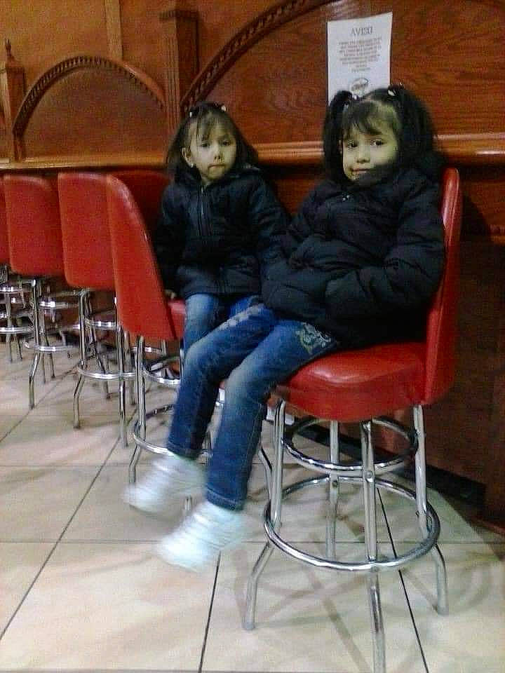 Andrea is registered to the contest to win money with this photo: chair, comfort, denim, design, event, floor, flooring, fun, furniture, hair, hardwood, human_leg, jeans, leg, leisure, long_hair, person, room, sitting, thigh