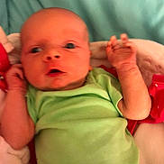 Joanie is registered to the contest to win money with this photo: cheek, child, finger, hand, infant, joint, lip, mouth, play, skin, thumb, toddler, toy