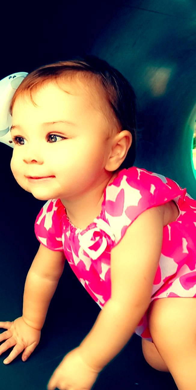 Malayah is registered to the contest to win money with this photo: baby_toddler_clothing, black_hair, cheek, cool, eyelash, facial_expression, finger, flash_photography, fun, hair, happy, human, lip, magenta, mouth, neck, nose, person, pink, skin