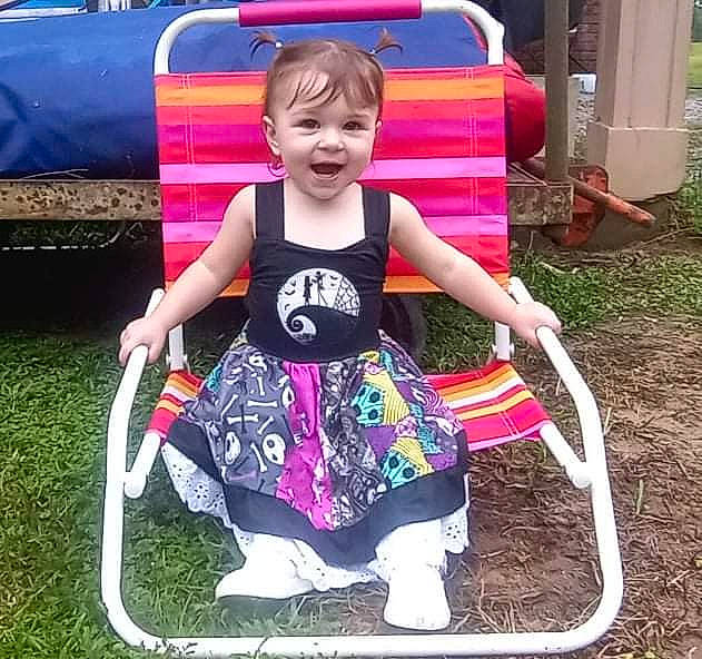 Malayah joined the competition — help win amazing prizes! baby_products, baby_toddler_clothing, chair, child, city, fun, grass, happy, joy, leisure, magenta, outdoor_furniture, person, pink, public_space, recreation, sitting, snapshot, summer, t_shirt