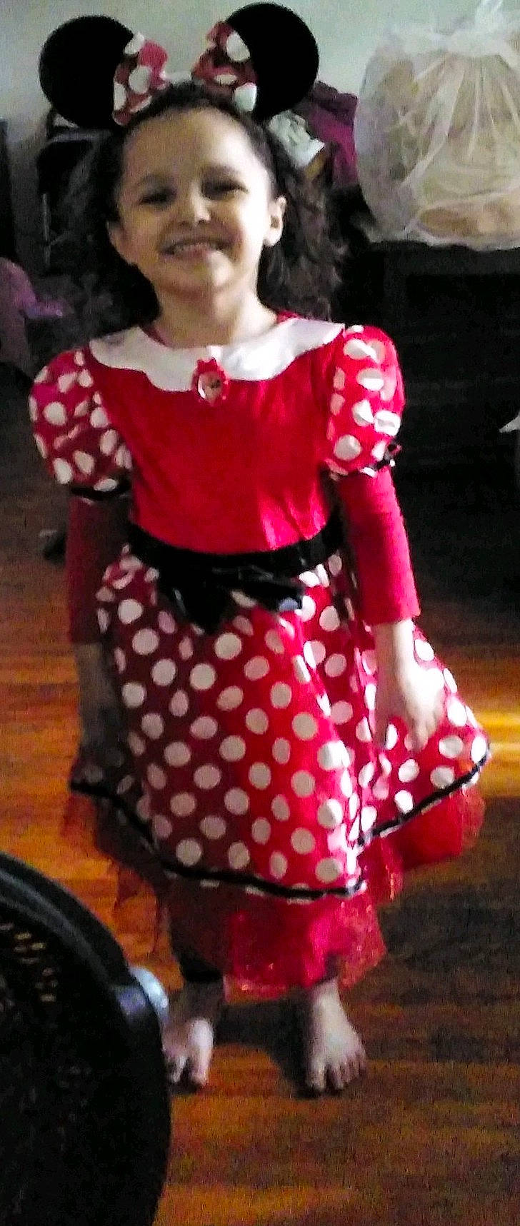 Aubrey is registered to the contest to win money with this photo: bicycle_tire, day_dress, entertainment, event, fashion_design, formal_wear, fun, human_leg, joy, magenta, one_piece_garment, pattern, performing_arts, person, pink, polka_dot, sleeve, tire, vintage_clothing, waist