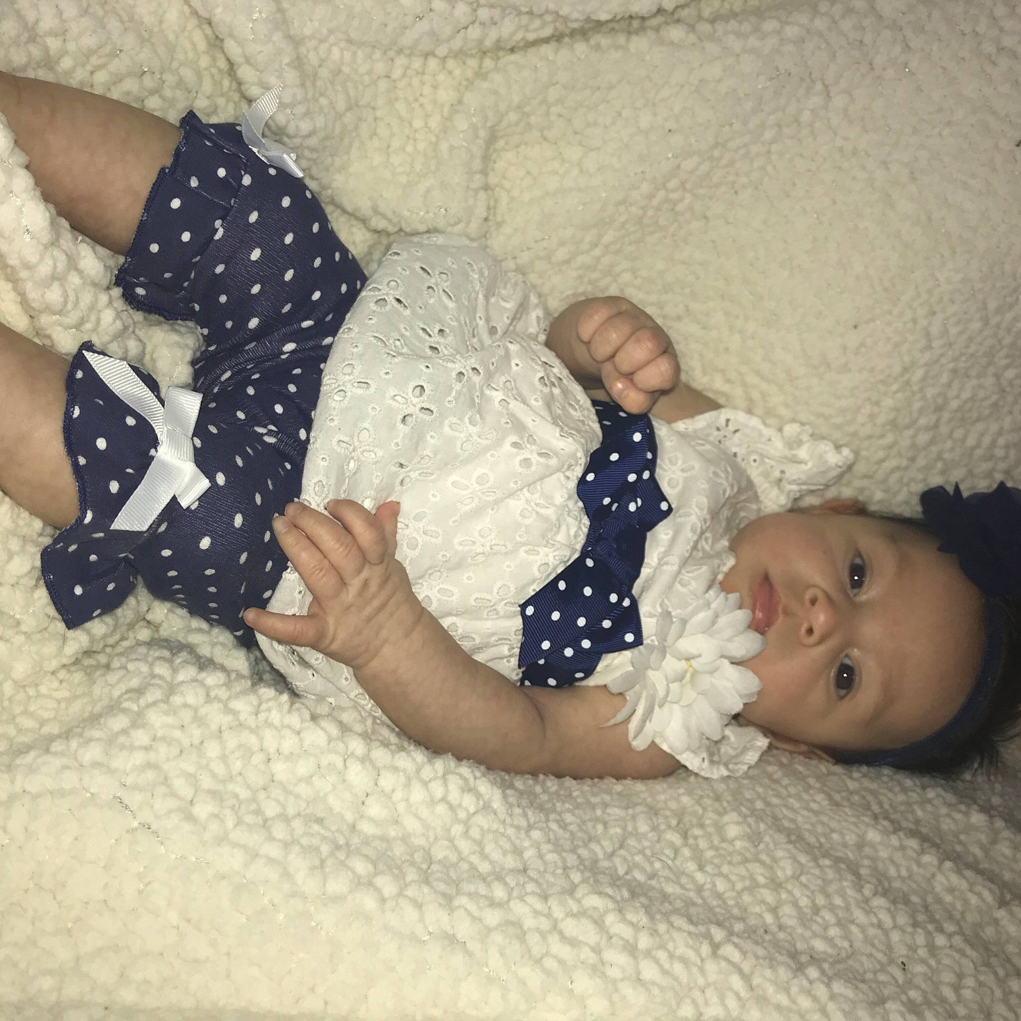 Isabella is registered to the contest to win money with this photo: baby, beauty, black_hair, child, design, hand, leg, love, pattern, person, skin, thigh, toddler