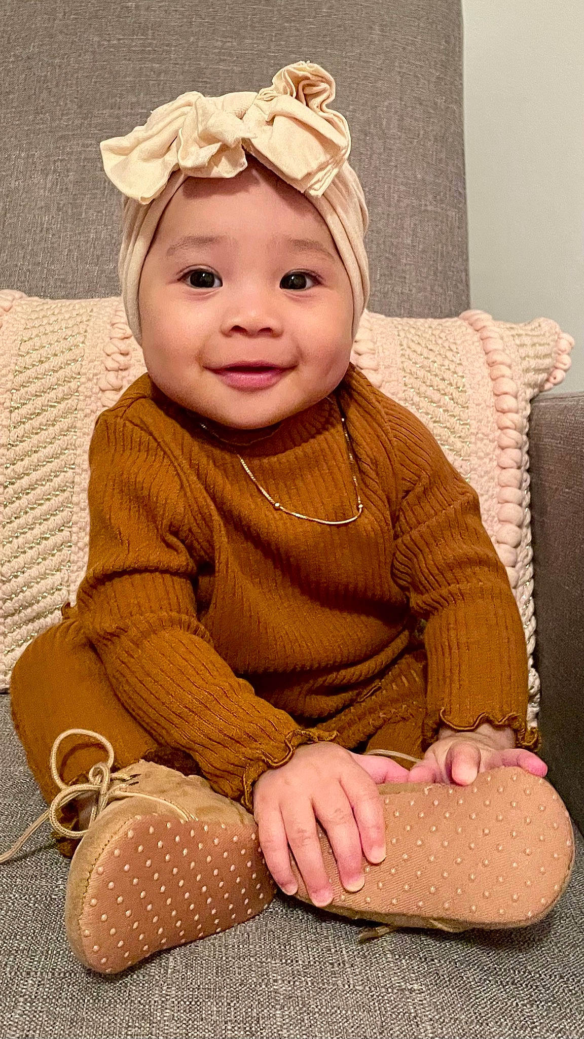 Isabella Rae is registered to the contest to win money with this photo: baby, baby_toddler_clothing, cheek, clothing, comfort, eye, hairstyle, happy, head, headgear, headwear, human_body, joy, lip, outerwear, person, pink, skin, sleeve, smile