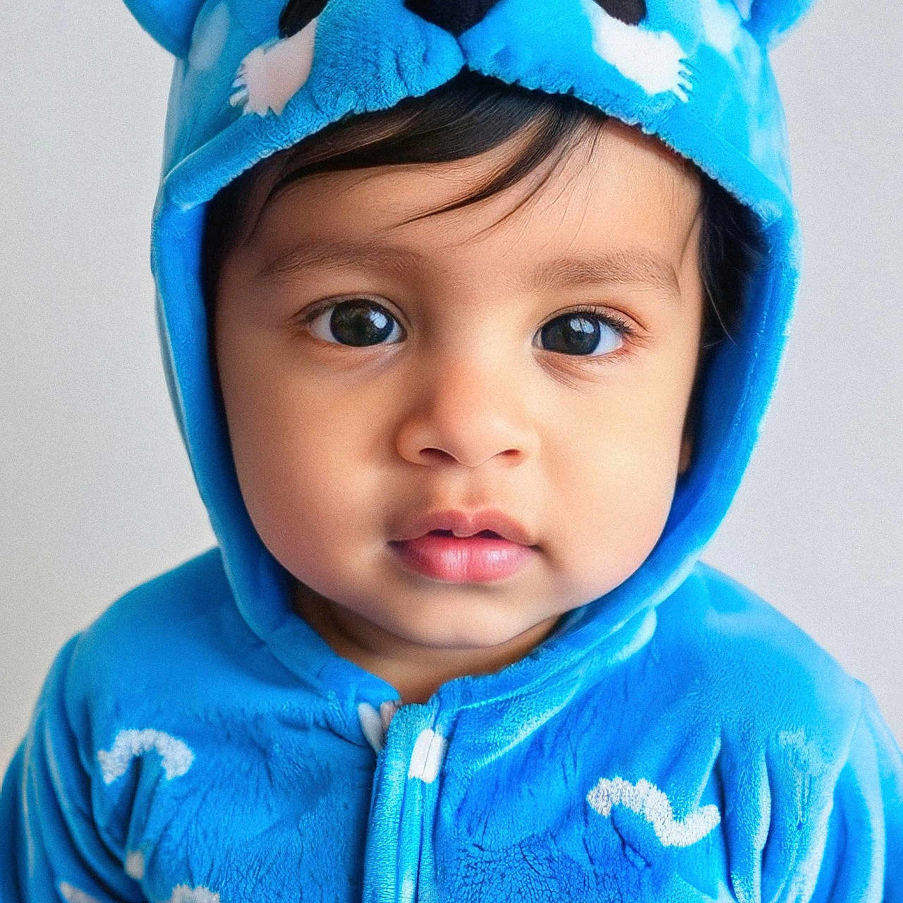 Vishak is registered to the contest to win money with this photo: baby, bonnet, cap, clothing, coat, face, fleece, glove, happy, hat, head, hood, hoodie, jacket, knitwear, person, photography, portrait, sweater, sweatshirt