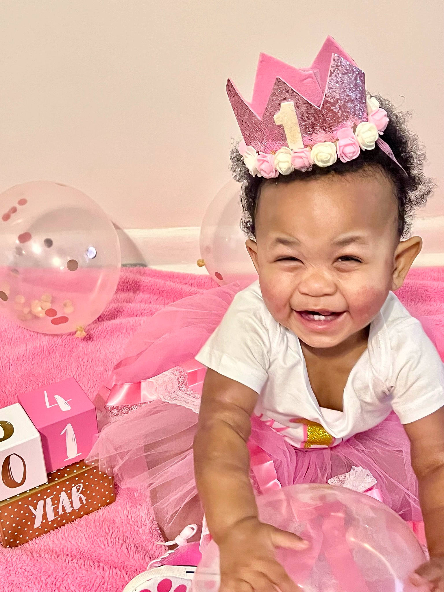 Brooklynn is registered to the contest to win money with this photo: baby, baby_toddler_clothing, birthday, birthday_party, child, costume_hat, event, fashion_accessory, happy, headband, headgear, headpiece, magenta, party, party_supply, person, pink, purple, smile, sweetness