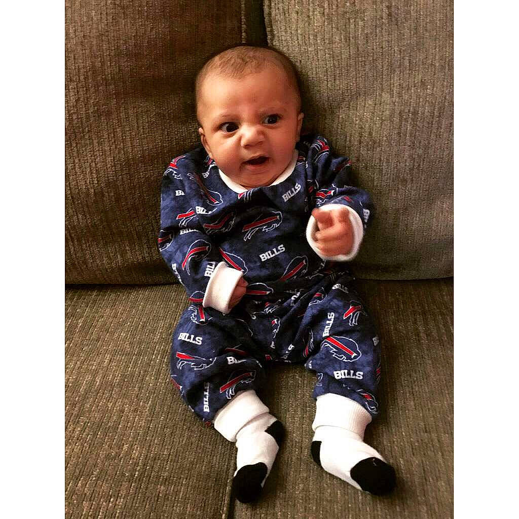 Luka joined the competition — help win amazing prizes! baby, baby_toddler_clothing, child, clothing, collar, comfort, elbow, face, flooring, happy, human_body, outerwear, pattern, person, portrait_photography, product, sitting, sleeve, smile, t_shirt