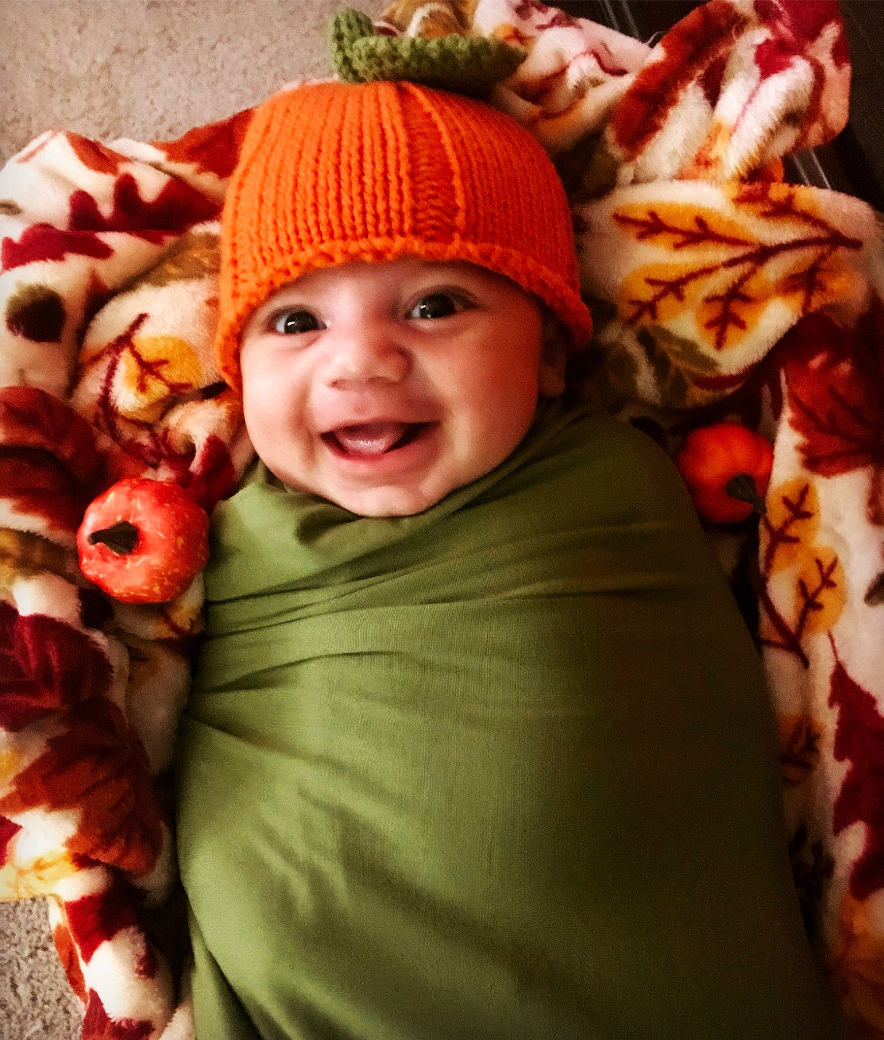 Luka joined the competition — help win amazing prizes! baby, cap, child, fruit, fun, grass, happy, head, headgear, headwear, human_body, joy, knit_cap, leaf, natural_foods, person, plant, red, smile, toddler