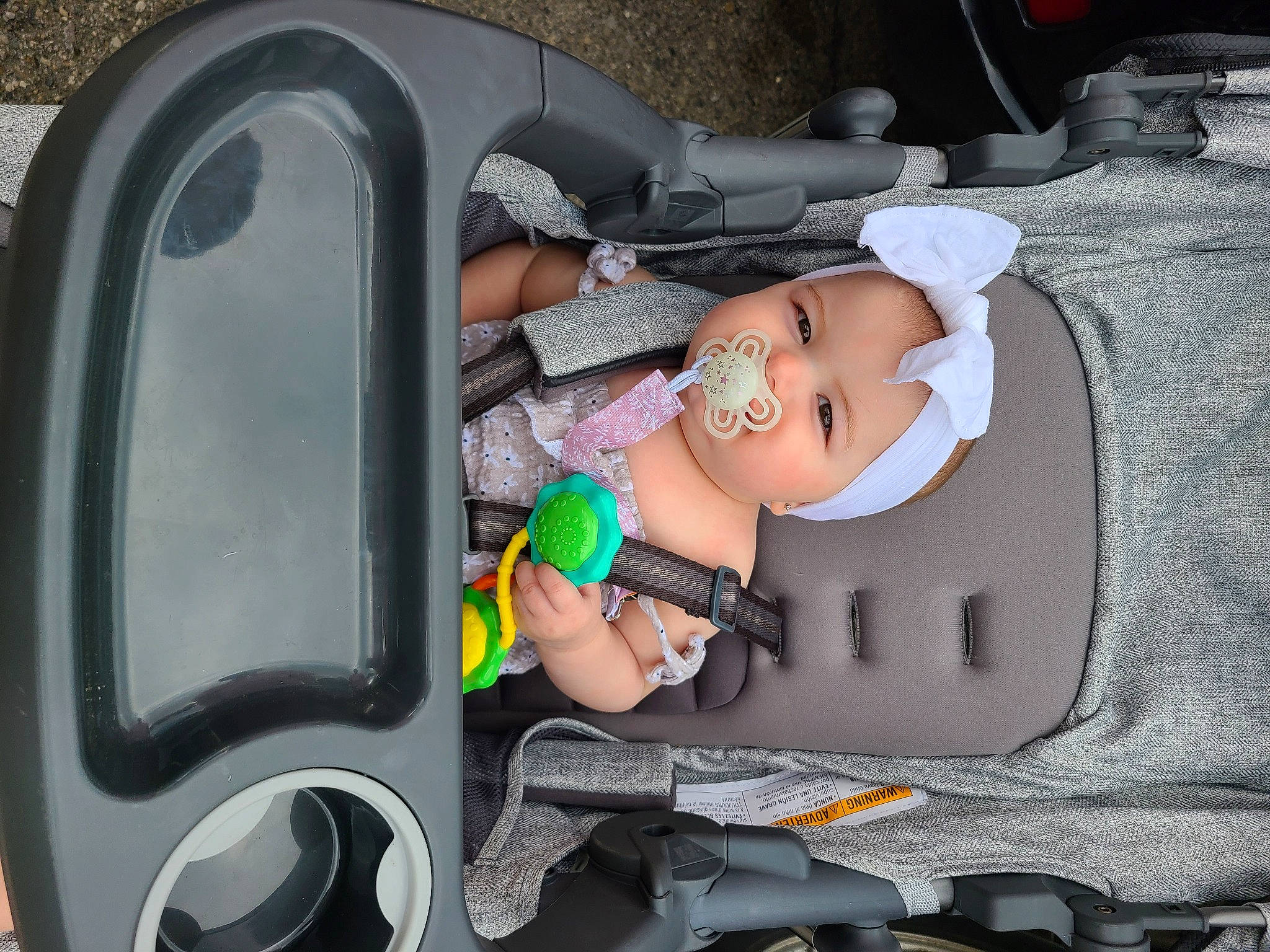 Maisie joined the competition — help win amazing prizes! auto_part, automotive_design, automotive_exterior, automotive_tire, automotive_wheel_system, baby, baby_carriage, baby_products, bumper, car_seat, child, comfort, family_car, fun, headwear, motor_vehicle, mouth, person, service, toddler