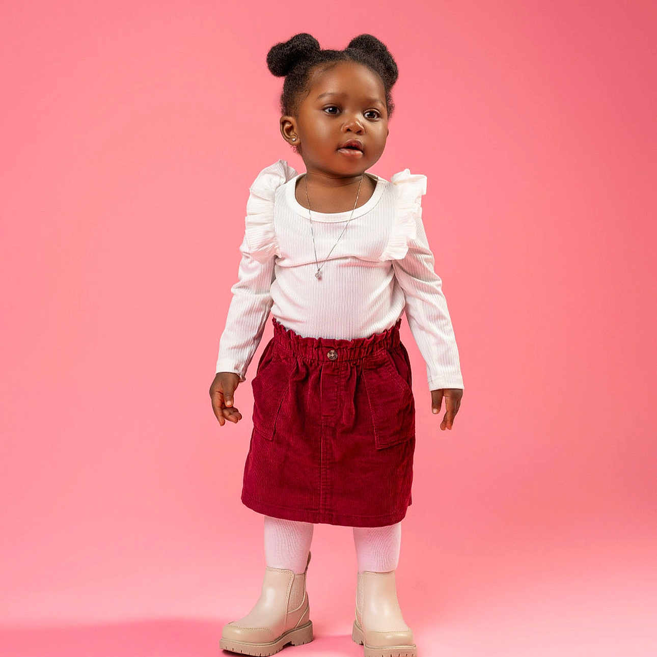 Kavonae is registered to the contest to win money with this photo: child, clothing, coat, dress, face, female, footwear, girl, happy, head, longsleeve, miniskirt, person, photography, portrait, shoe, skirt, sleeve, smile, standing