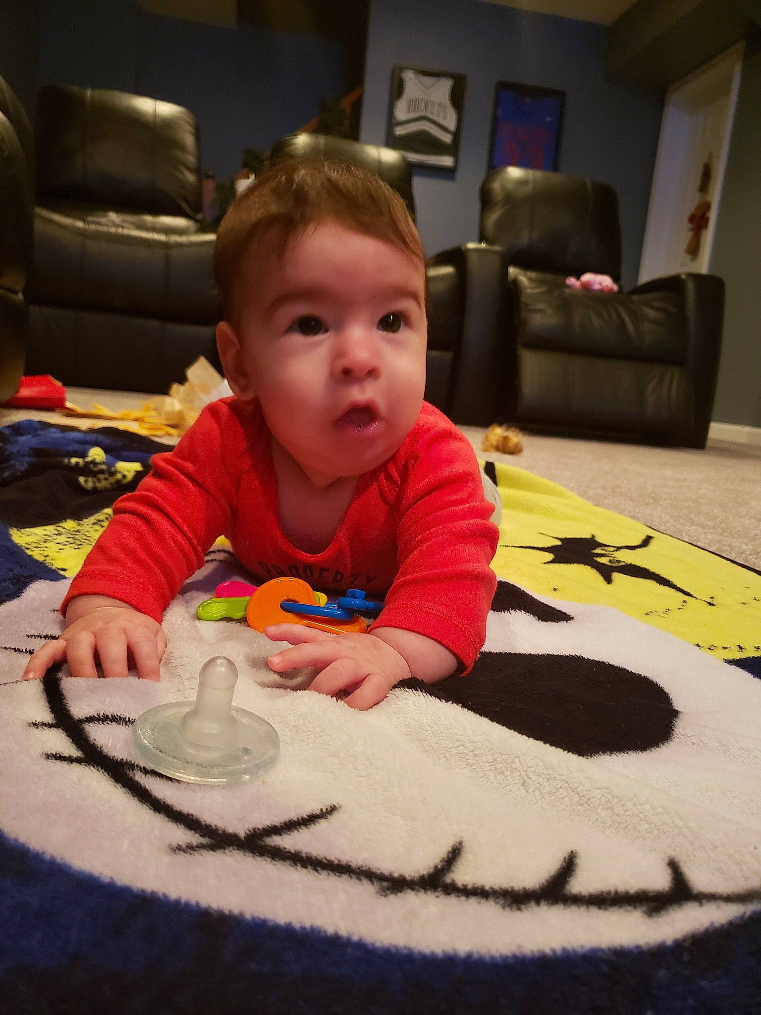 Silas is registered to the contest to win money with this photo: boy, child, day, flooring, fun, infant, material, person, play, product, sitting, smile, surprise, textile, toddler