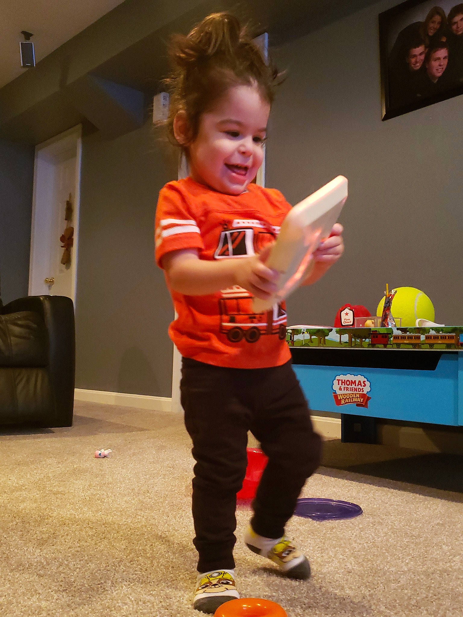 Alekzandr is registered to the contest to win money with this photo: arm, boy, child, clothing, costume, footwear, fun, girl, joy, outerwear, person, play, product, recreation, red, shoulder, standing, t_shirt, toddler