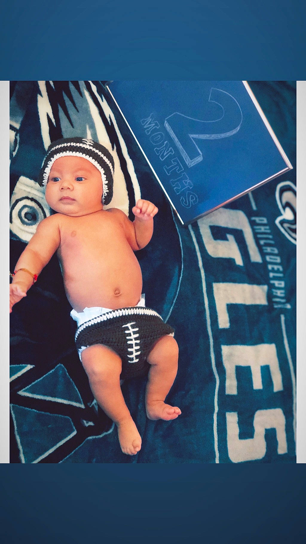 Juelz is registered to the contest to win money with this photo: advertising, arm, barechestedness, chest, finger, hand, headwear, male, muscle, person, thigh