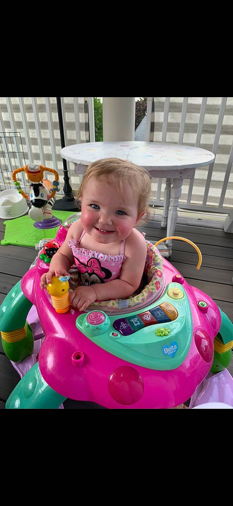 Hadley joined the competition — help win amazing prizes! baby, baby_playing_with_toys, baby_products, baby_toddler_clothing, chair, child, fun, happy, joy, leisure, magenta, person, pink, recreation, riding_toy, smile, table, tire, toddler, toy