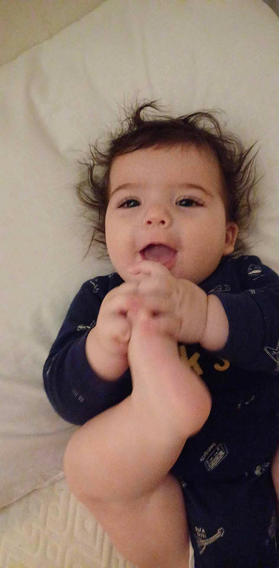 Marlie is registered to the contest to win money with this photo: arm, baby, baby_toddler_clothing, cheek, eye, eyebrow, eyelash, finger, gesture, happy, iris, lip, nail, neck, nose, person, skin, sleeve, smile, thumb