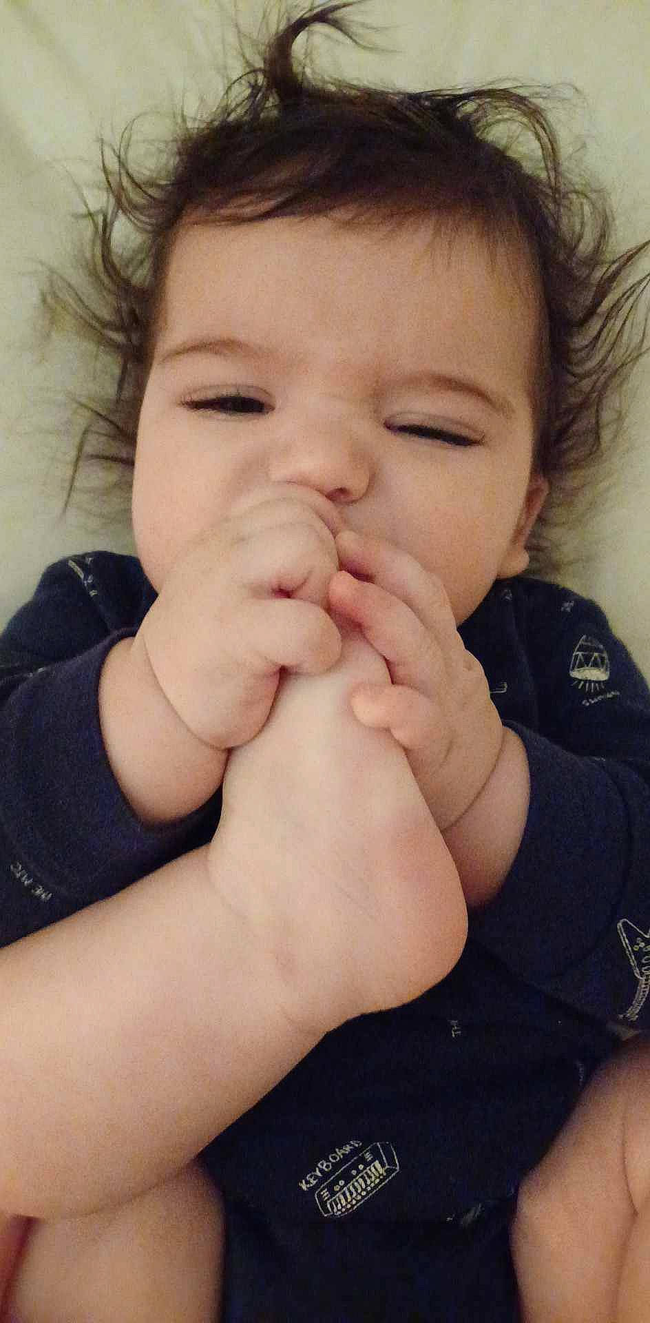 Marlie is registered to the contest to win money with this photo: baby, biting, cheek, child, ear, eyebrow, eyelash, finger, gesture, hand, happy, lip, mouth, nail, nose, person, skin, sleeve, thumb, toddler