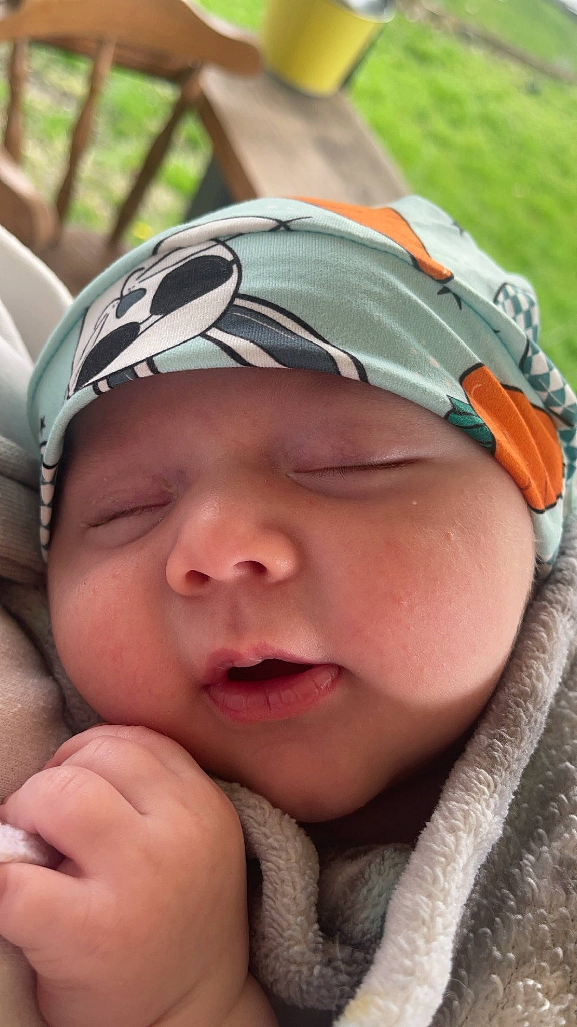 Malakhi joined the competition — help win amazing prizes! baby, cap, cheek, chin, eyebrow, eyelash, face, finger, gesture, grass, green, happy, headwear, lip, mouth, nose, person, pink, plant, skin