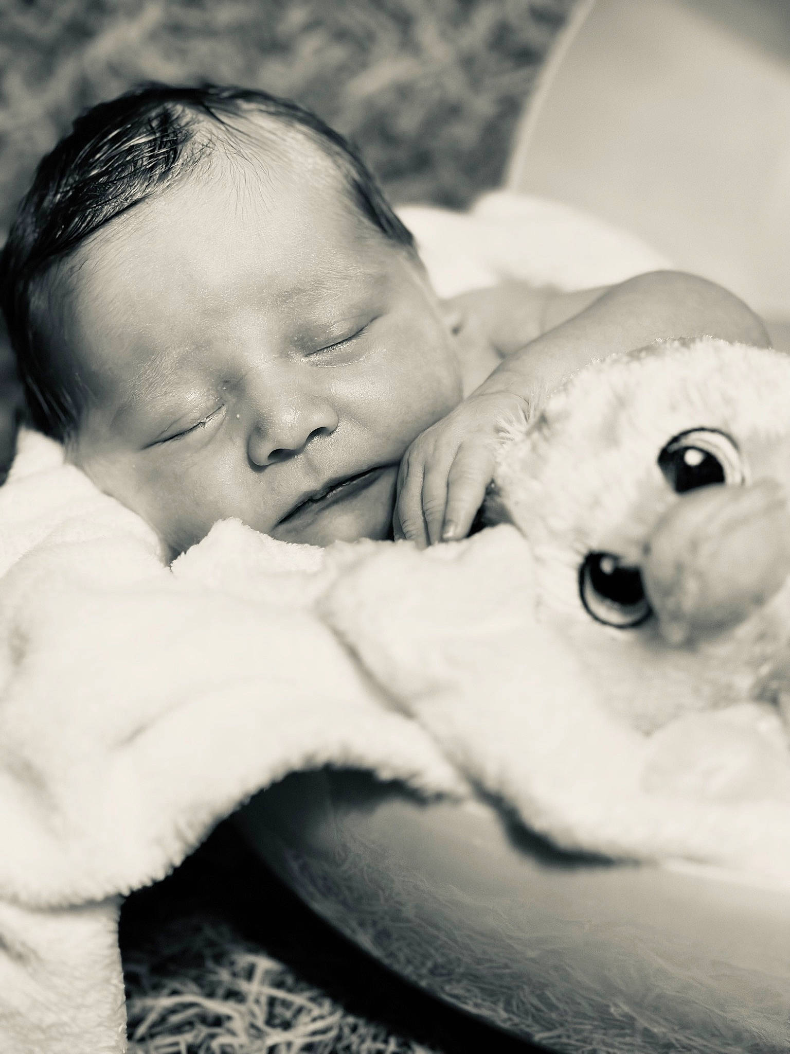Malakhi is registered to the contest to win money with this photo: baby, baby_toddler_clothing, cheek, child, close_up, comfort, eye, flash_photography, grass, happy, iris, lip, love, monochrome, monochrome_photography, nose, people_in_nature, person, skin, teddy_bear