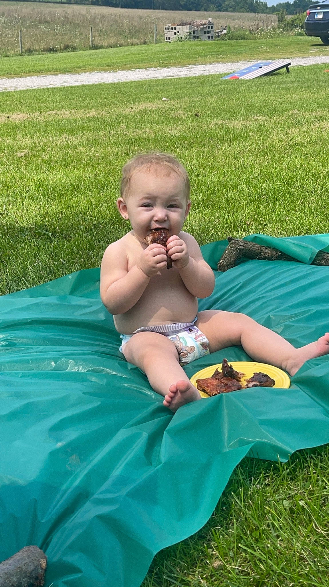 Azayla joined the competition — help win amazing prizes! baby, barefoot, child, event, foot, fun, grass, grass_family, grassland, lap, lawn, leisure, outdoor_furniture, people_in_nature, person, plant, recreation, sitting, sun_tanning, thigh