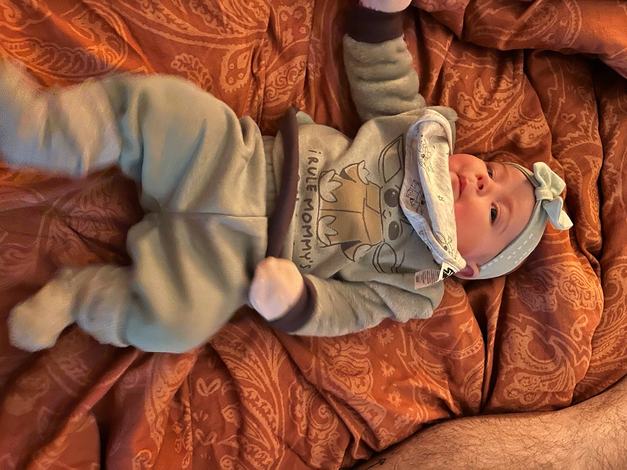 Magna joined the competition — help win amazing prizes! abdomen, arm, baby, baby_toddler_clothing, brown, comfort, glasses, headwear, human_body, human_leg, linens, nail, pattern, person, sitting, skin, sleeve, textile, thumb, toddler