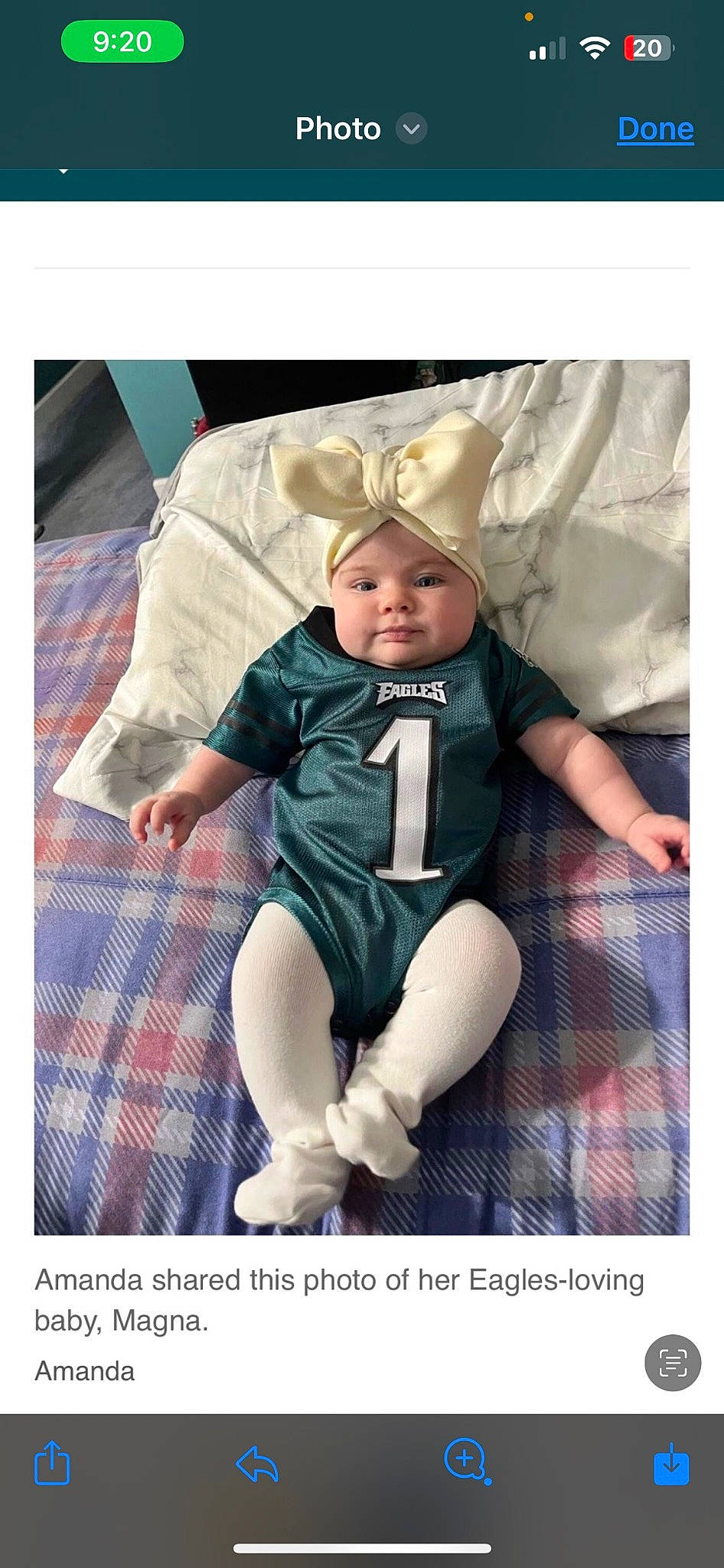 Magna is registered to the contest to win money with this photo: baby, baby_products, baby_toddler_clothing, child, comfort, face, happy, headwear, leg, linens, pattern, person, photo_caption, plaid, product, sitting, sleeve, stock_photography, tartan, textile