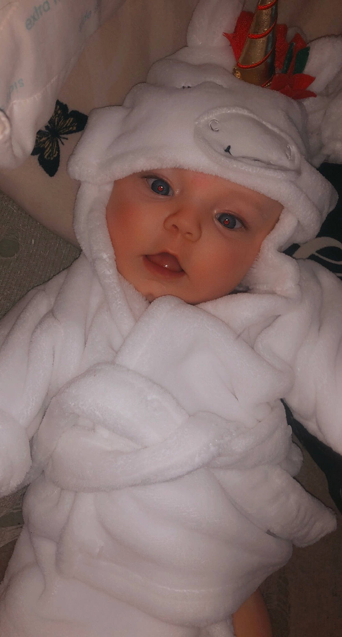 Christine joined the competition — help win amazing prizes! baby, baby_toddler_clothing, cheek, child, comfort, eye, eyebrow, eyelash, fur, hat, headwear, iris, linens, person, room, skin, thumb, toddler