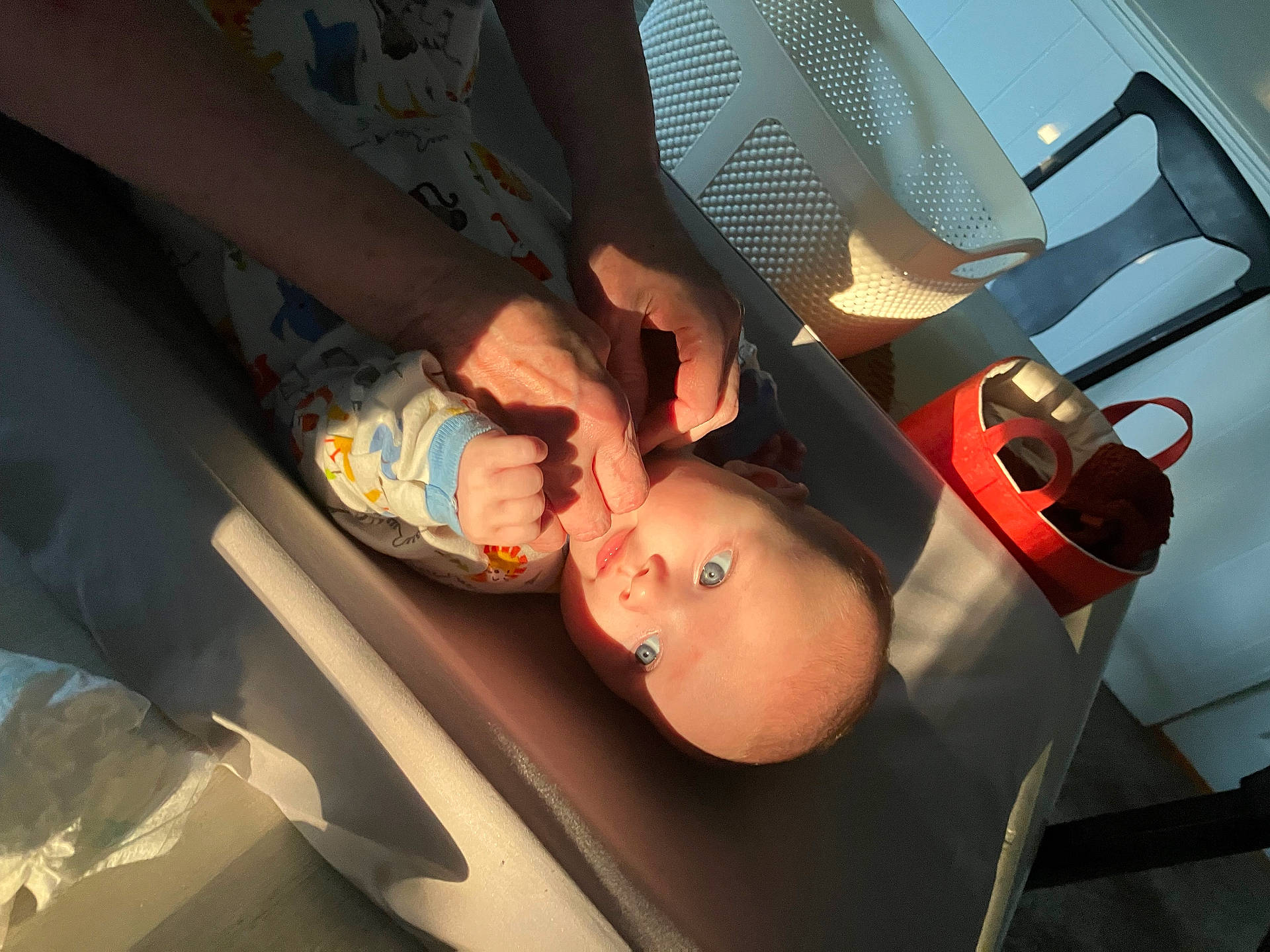 Jaxon is registered to the contest to win money with this photo: accessories, architecture, baby, bodypart, building, crib, cup, cutlery, diaper, face, finger, furniture, hand, head, hospital, infantbed, person, photography, portrait, spoon