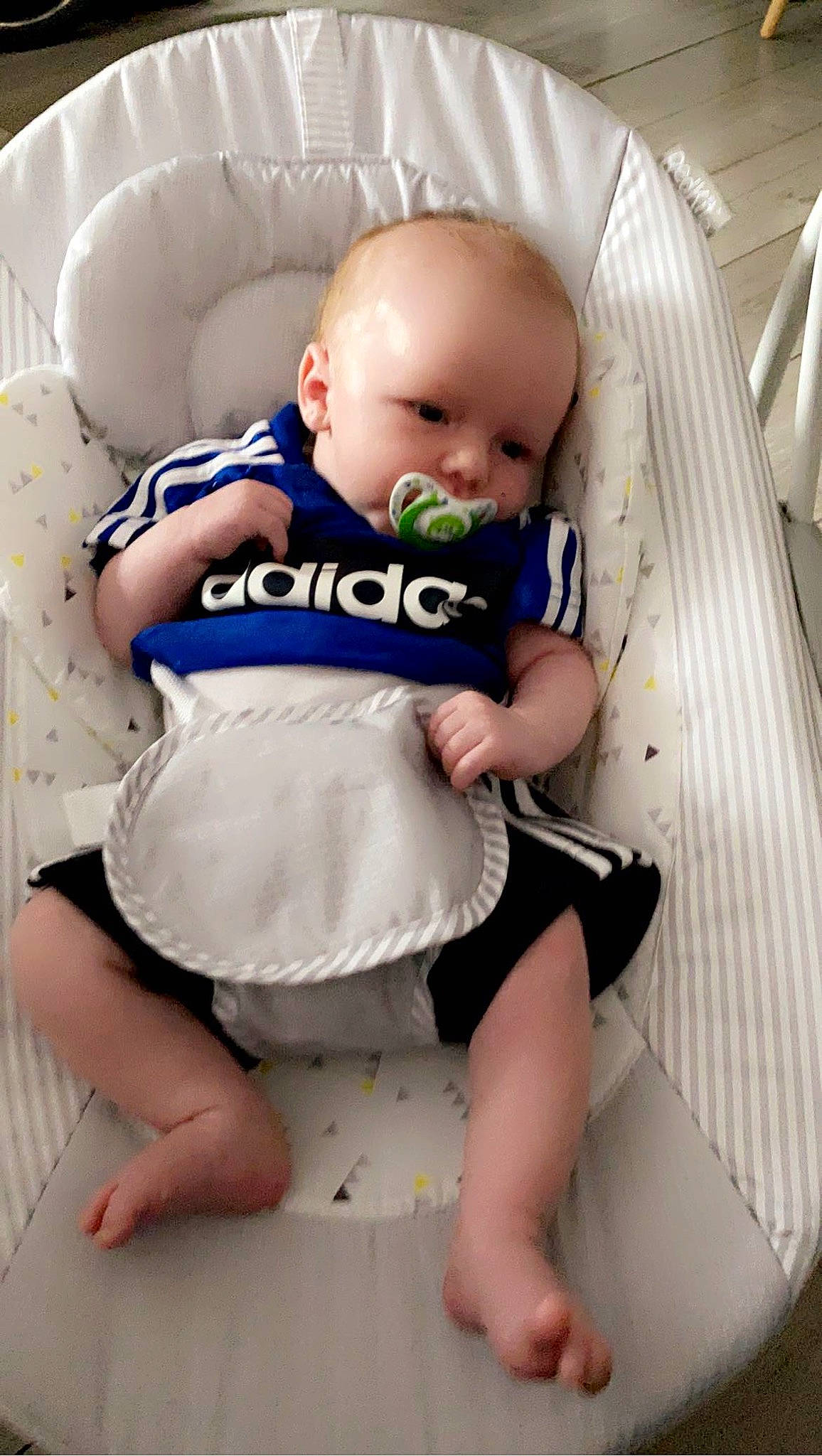 Kyren is registered to the contest to win money with this photo: baby, baby_products, baby_safety, baby_sleeping, baby_toddler_clothing, barefoot, child, comfort, eye, finger, foot, head, human_body, human_leg, knee, person, photograph, skin, sleeve, thigh