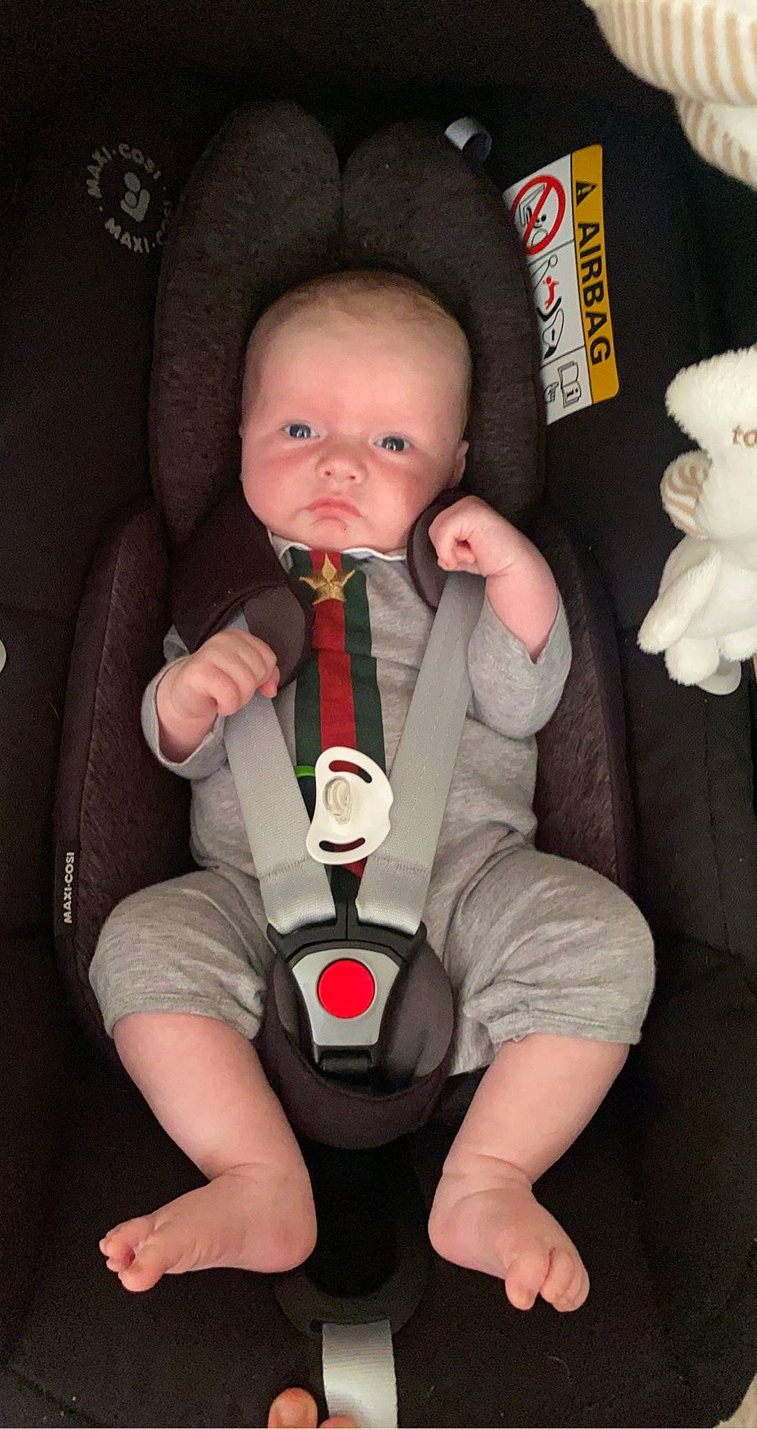 Kyren is registered to the contest to win money with this photo: arm, baby, baby_in_car_seat, baby_toddler_clothing, cheek, comfort, eye, finger, hand, leg, mouth, nail, person, product, seat_belt, skin, sleeve, thigh, thumb, toddler