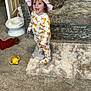 Bonnie joined the competition — help win amazing prizes! toddler, child, indoor, living_room, carpet, rug, sofa, pajamas, hat, toy, smiling, person, furniture, floor, play, cute, home, cozy, clothing, expression