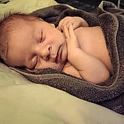 Anthony joined the competition — help win amazing prizes! baby, newborn, sleeping, blanket, towel, face, infant, hands, skin, bed, bedding, cozy, portrait, closeup, nap, soft, asleep, peaceful, comfort, texture