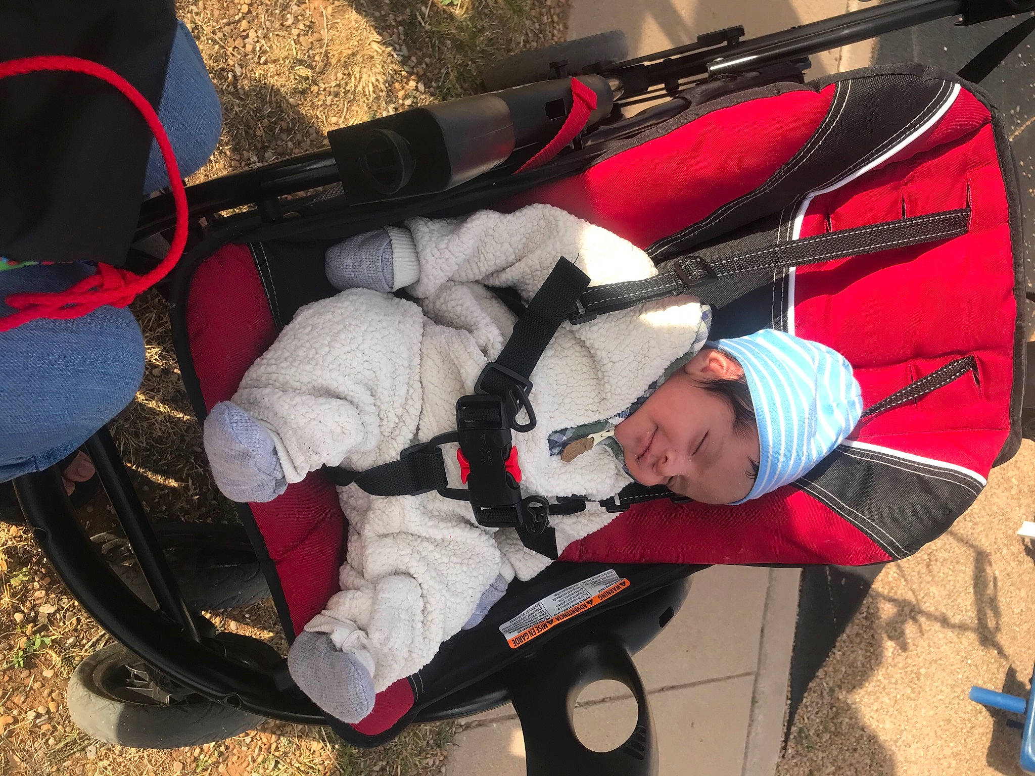 Lee joined the competition — help win amazing prizes! baby_carriage, baby_products, baby_safety, baggage, bicycle_handlebar, carmine, comfort, headwear, lap, person, product, synthetic_rubber, toy, walking_shoe