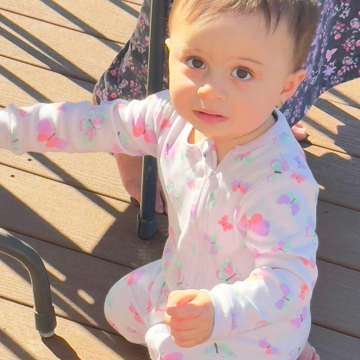 Kaitlyn joined the competition — help win amazing prizes! baby, bodypart, clothing, dress, face, finger, furniture, hand, handrail, head, longsleeve, outdoors, pajamas, pants, person, photography, portrait, sitting, sleeve, wood
