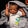 newborn, baby, sleeping, blanket, clothing, dinosaur, onesie, infant, cute, soft, cozy, portrait, child, wrapped, resting, peaceful, skin, head, hands, warm