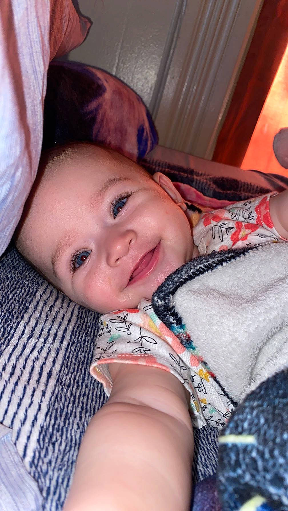 Nylah is registered to the contest to win money with this photo: baby, cheek, chin, comfort, cool, eye, eyebrow, facial_expression, finger, hair, happy, head, human, iris, joy, lip, mouth, neck, nose, person