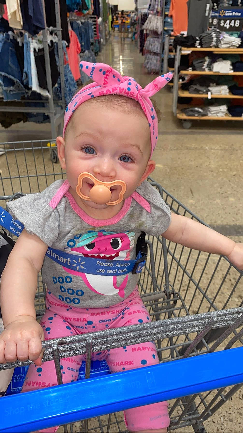 Nylah is registered to the contest to win money with this photo: baby, baby_products, baby_toddler_clothing, child, event, fun, grass, happy, leisure, magenta, person, pink, public_space, recreation, sitting, skin, smile, tire, toddler, vacation