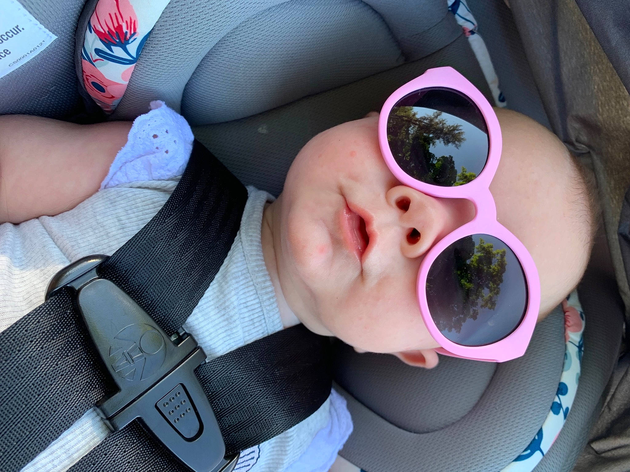 Amirah is registered to the contest to win money with this photo: auto_part, car_seat, carmine, child, comfort, eye_glass_accessory, eyewear, finger, fun, glasses, goggles, hand, helmet, nail, nose, person, personal_protective_equipment, sunglasses, toddler, vision_care