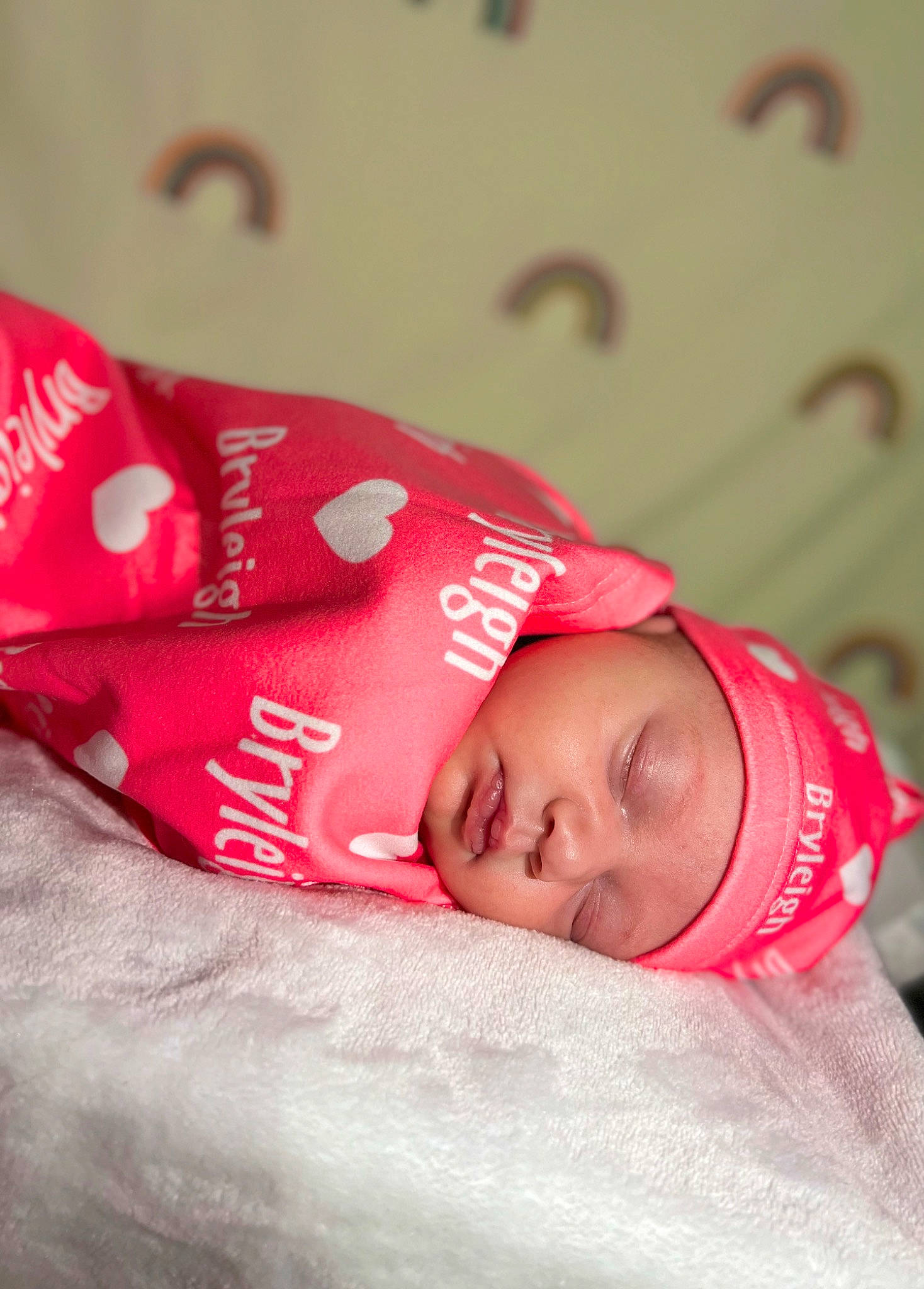 Bryleigh is registered to the contest to win money with this photo: baby, baby_products, baby_sleeping, baby_toddler_clothing, bedtime, carmine, cheek, child, comfort, fashion_accessory, flesh, font, happy, headwear, linens, lip, magenta, peach, person, room