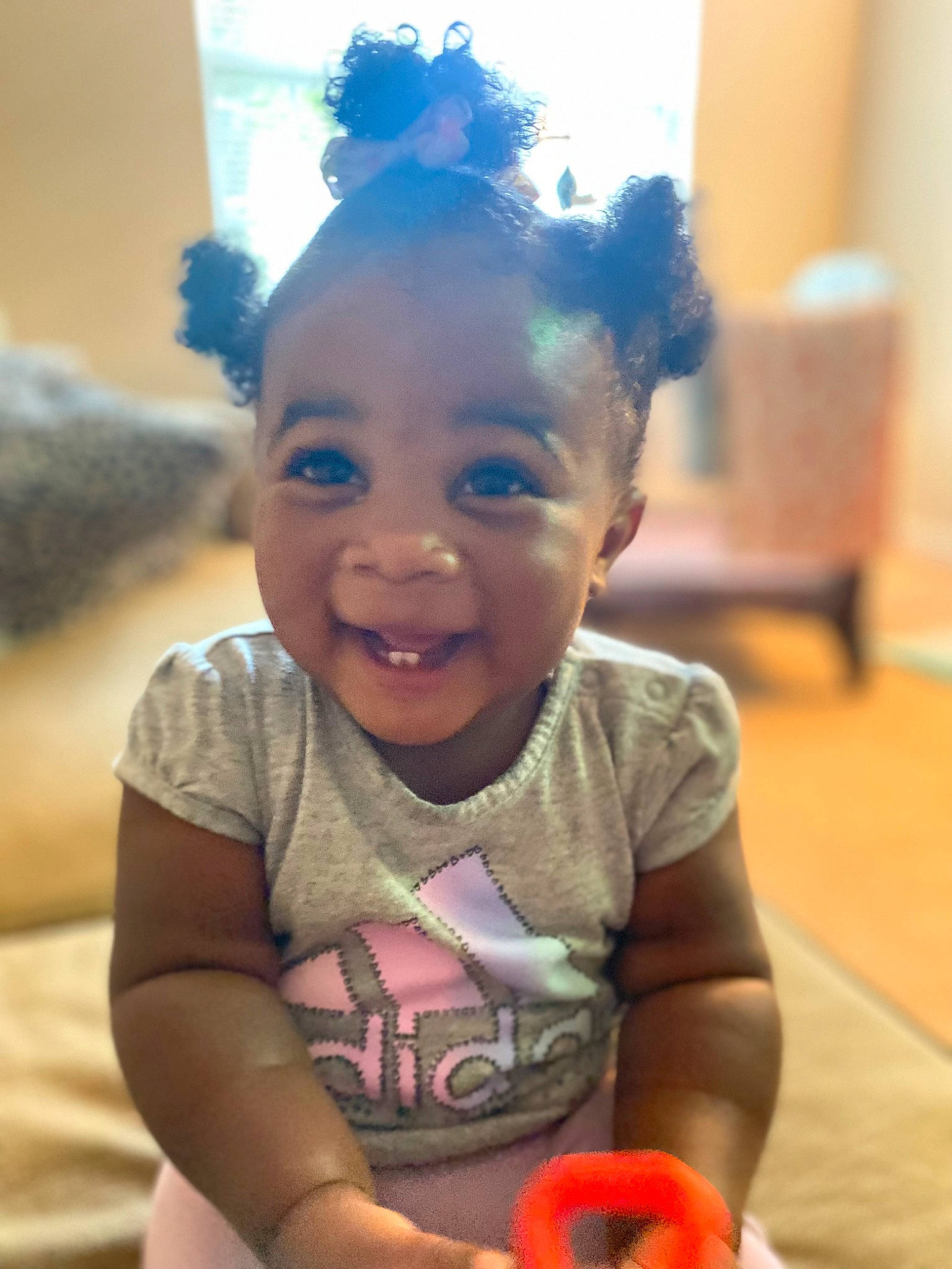 Iyana joined the competition — help win amazing prizes! arm, baby, baby_toddler_clothing, cheek, child, chin, ear, event, fun, happy, human_body, iris, leisure, nose, person, sitting, skin, smile, t_shirt, toddler