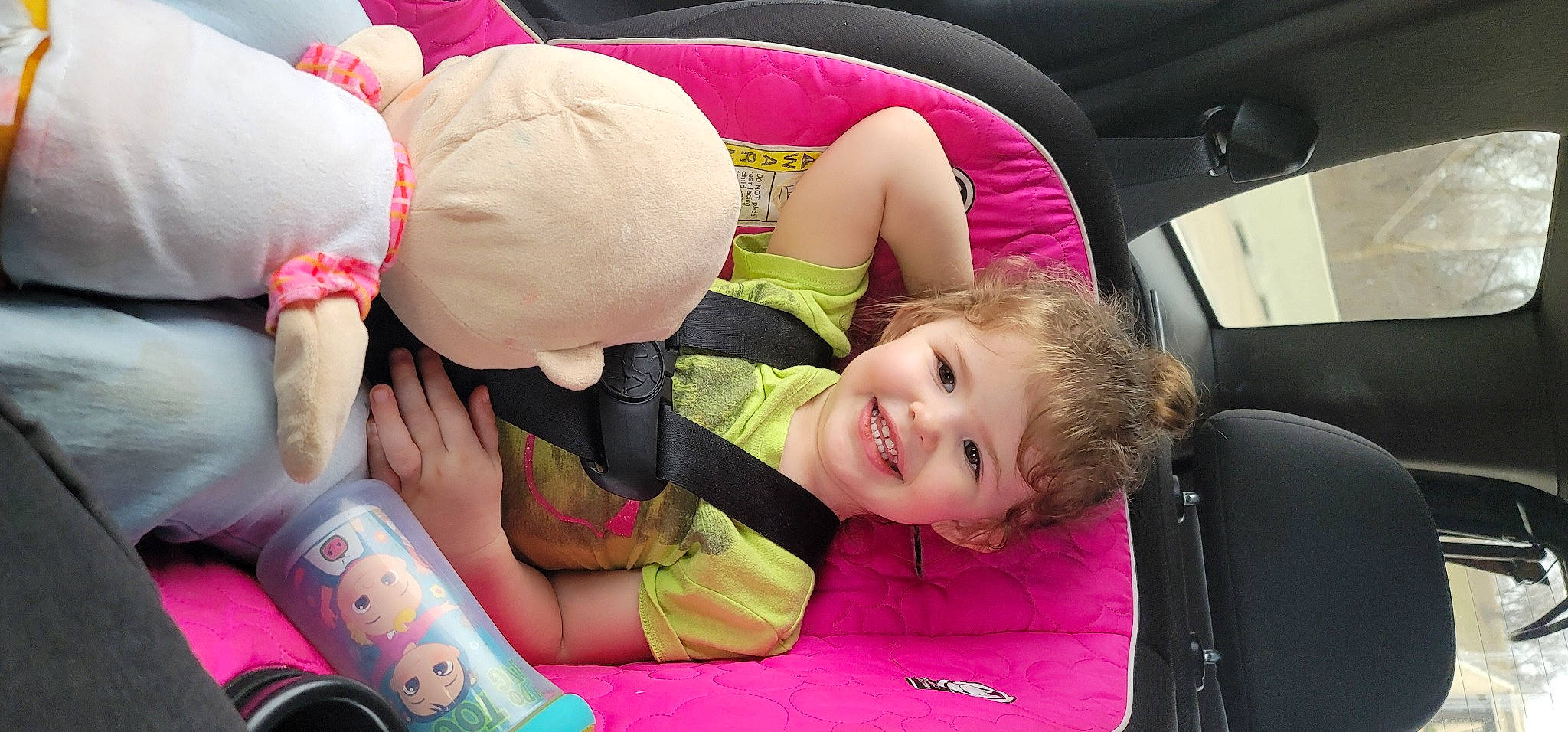 Aaliyah is registered to the contest to win money with this photo: baby, baby_playing_with_toys, car_seat, child, comfort, event, facial_expression, fun, happy, human_leg, joy, leisure, mammal, person, pink, sitting, smile, snapshot, sock, thigh