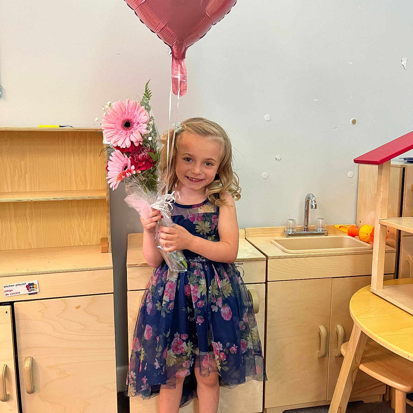 Abigail joined the competition — help win amazing prizes! balloon, child, clothing, dress, face, female, flower, flowerarrangement, flowerbouquet, girl, head, indoors, interiordesign, people, person, photography, plant, portrait, sink, wood